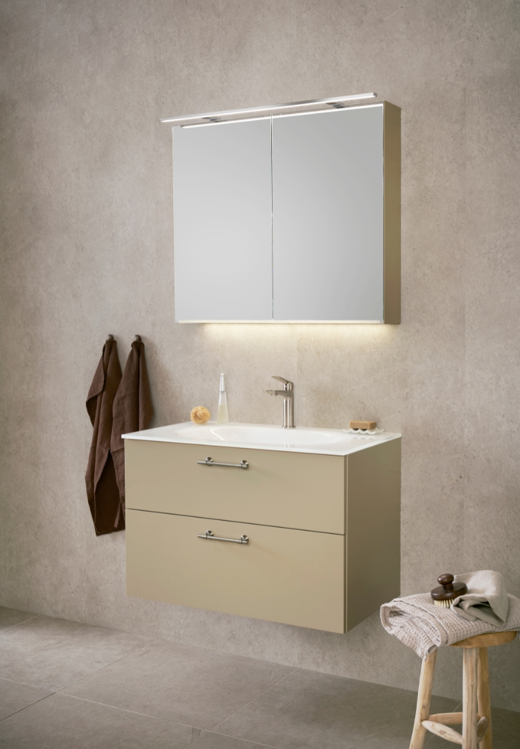 Beige servantskap med speilskap